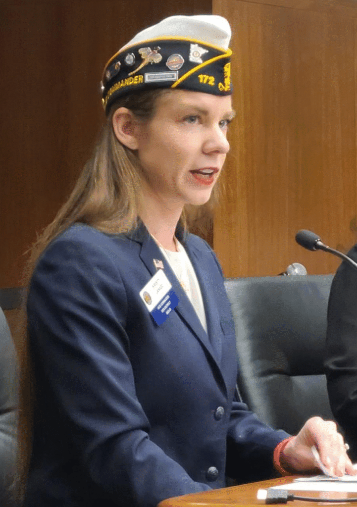 Kristy Janigo testifying at the State Legislature in her VFW hat.