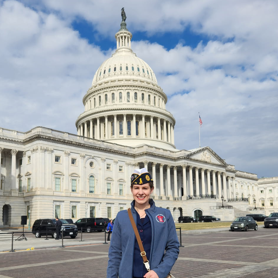 Kristy Janigo stands in front of the US Capitol in her VFW uniform.