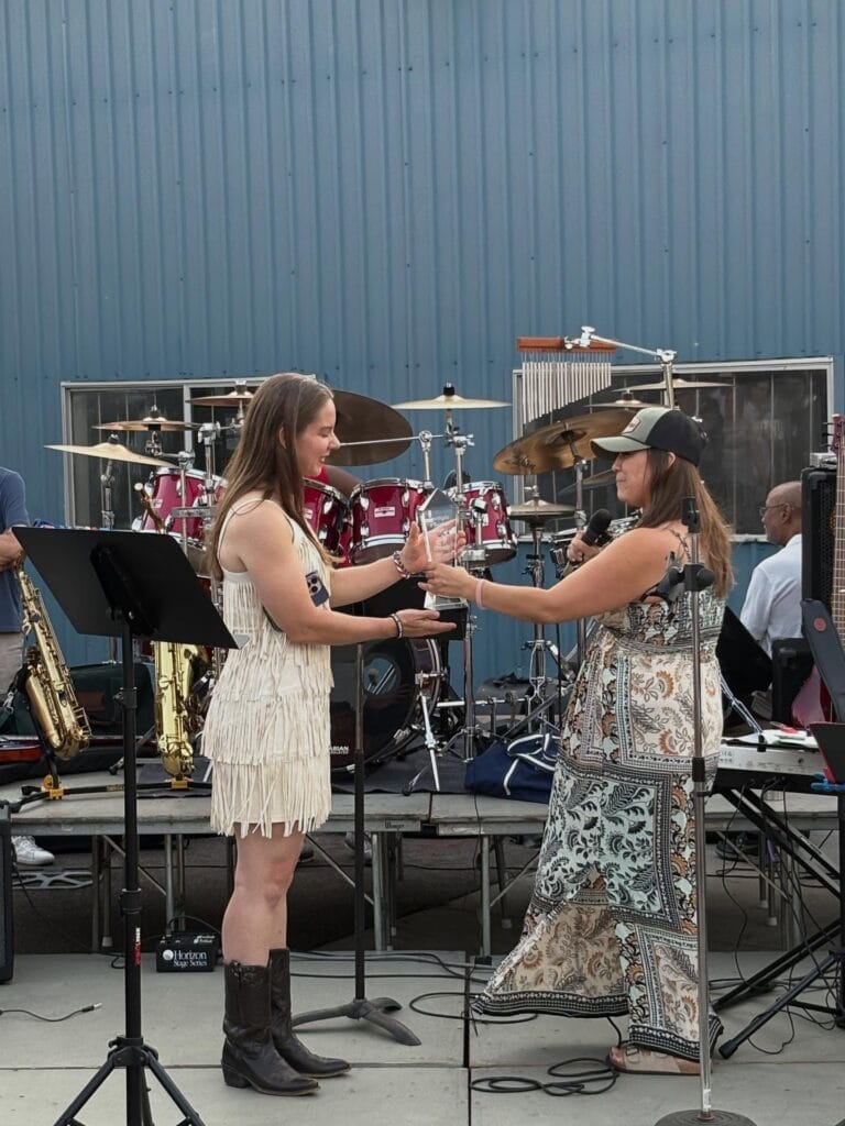 Kristy Janigo receiving Bill's Wish "Spotlight a Solider" award.