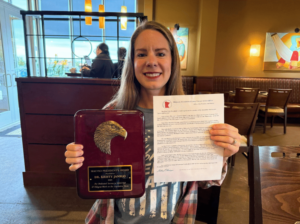 Kristy Janigo holding the MACVSO President's Award
